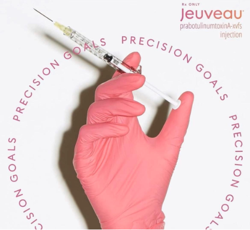 Jeuveau Flyer with a hand holding a needle. The words "Precision Goals" are around the image.